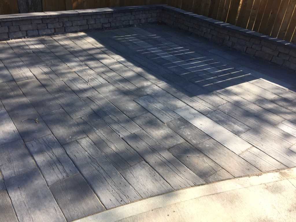 Stone patio with small walls
